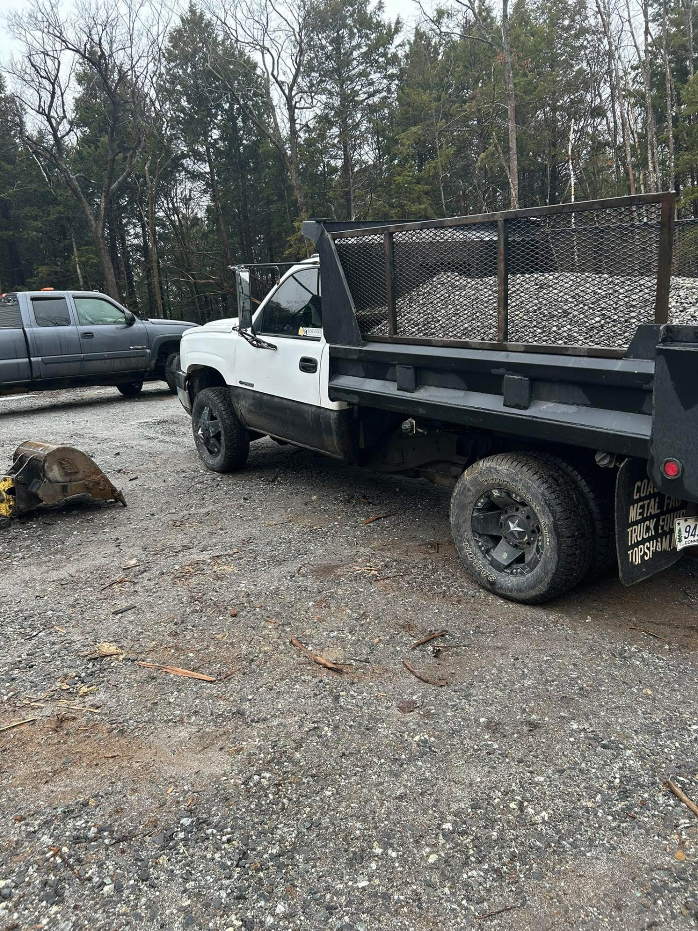 NK Services dump truck loaded with crushed gravel
